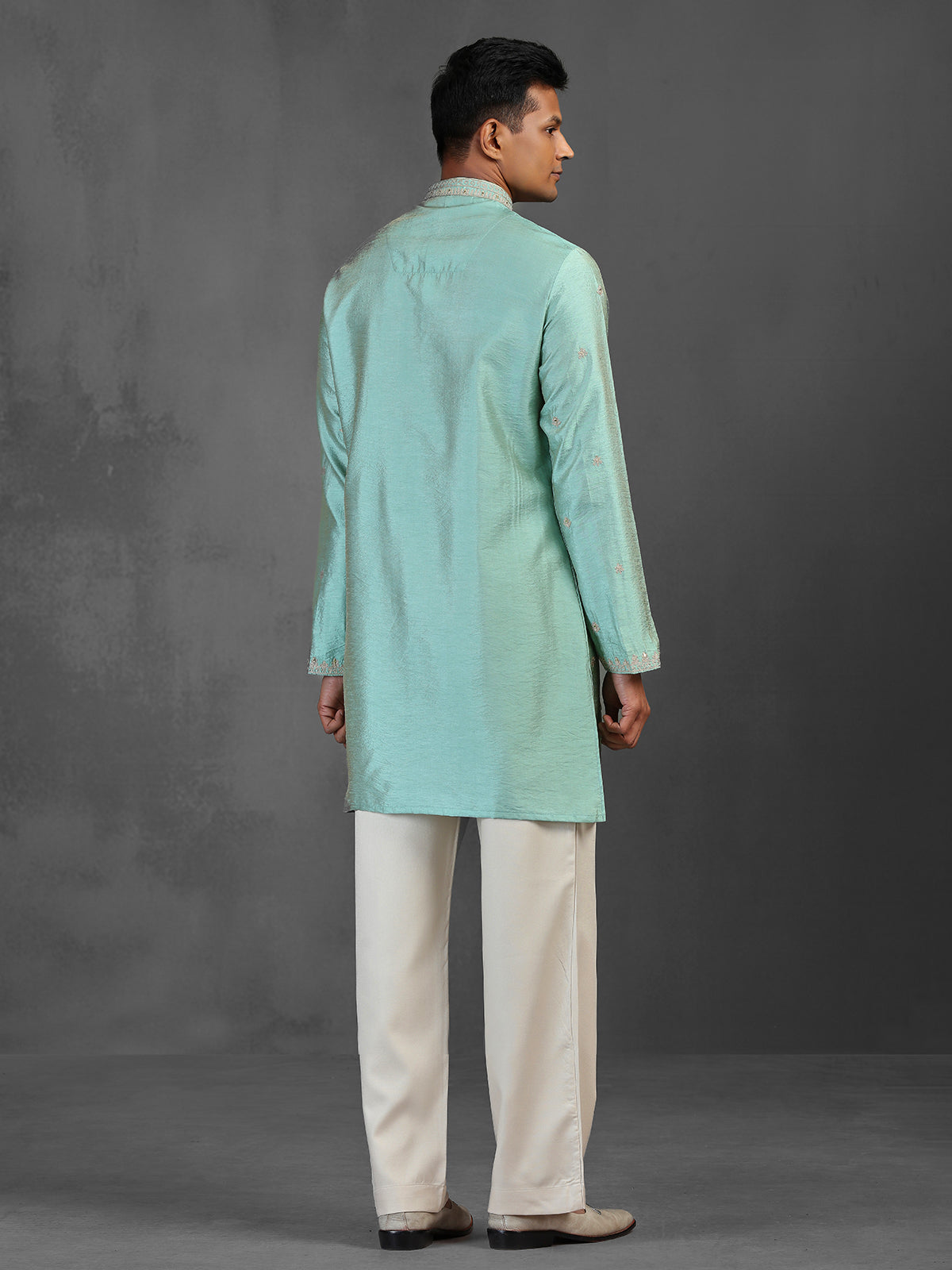 Light aqua art silk kurta suit for traditional celebration