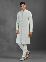 Light pista silk sherwani with thread and stone detailing