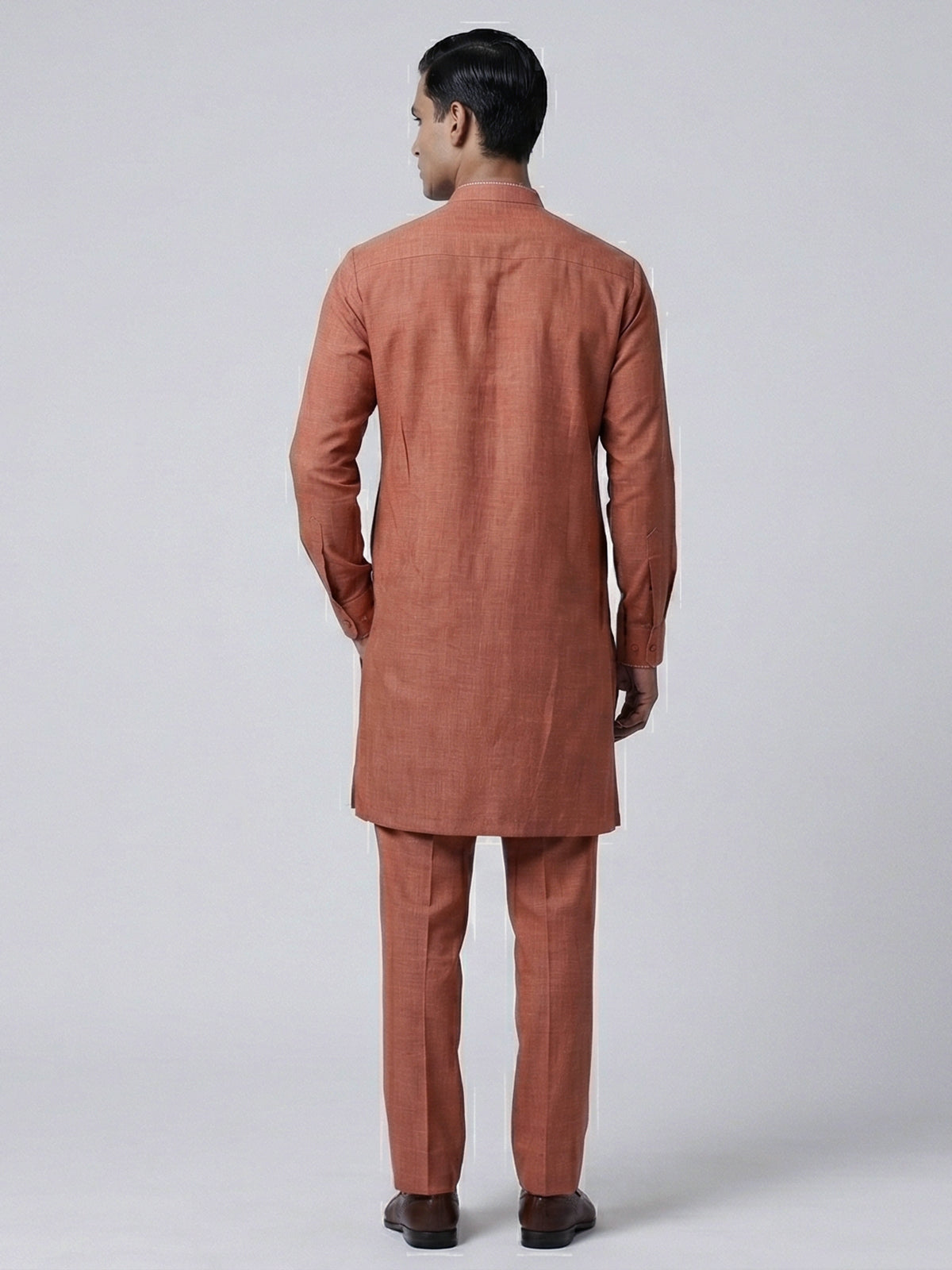 Dark peach linen kurta suit with brotch