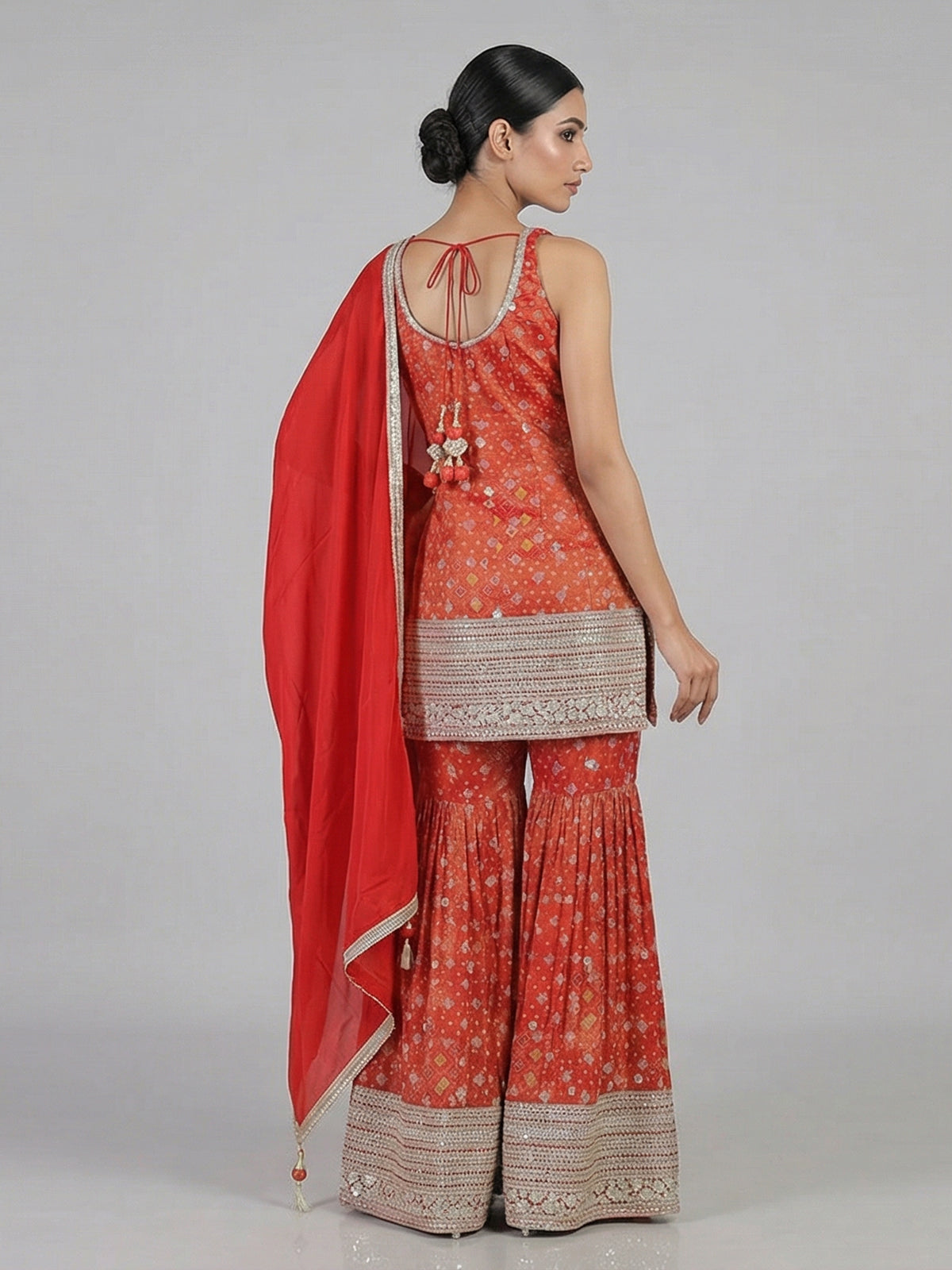Rust orange printed sharara suit festive elegance