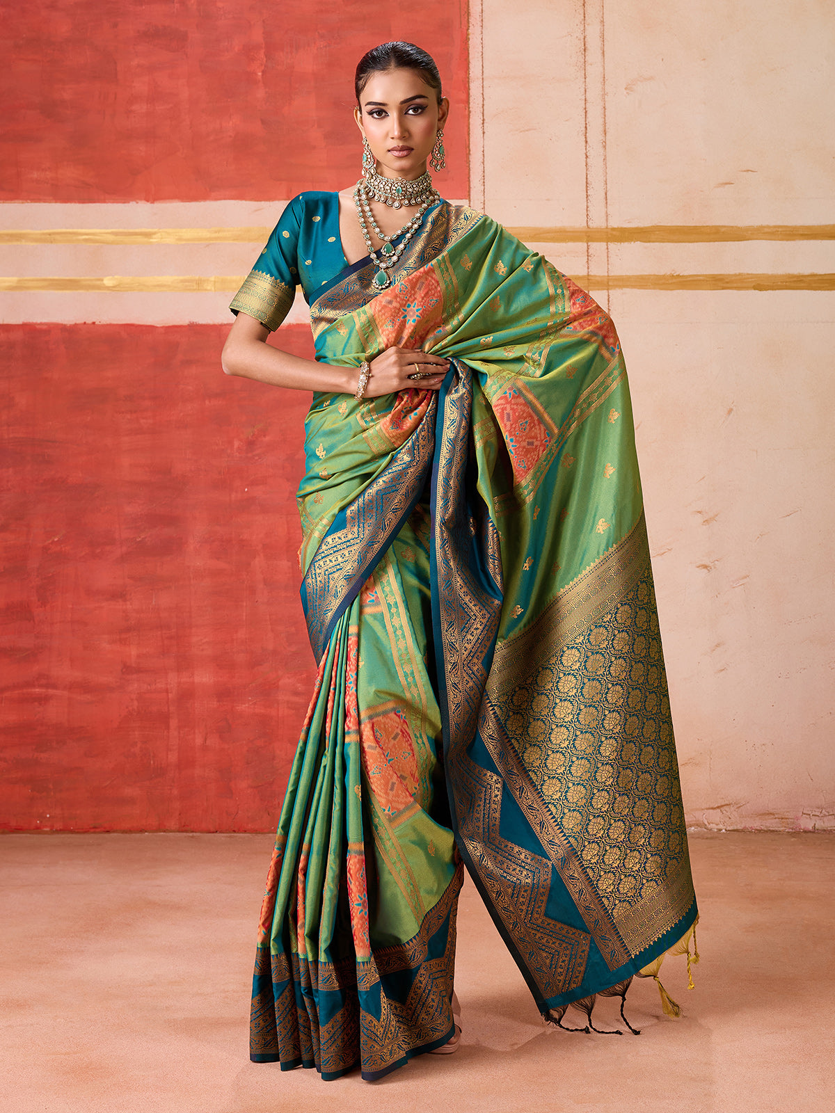 Green silk saree with highlighted contrasting border