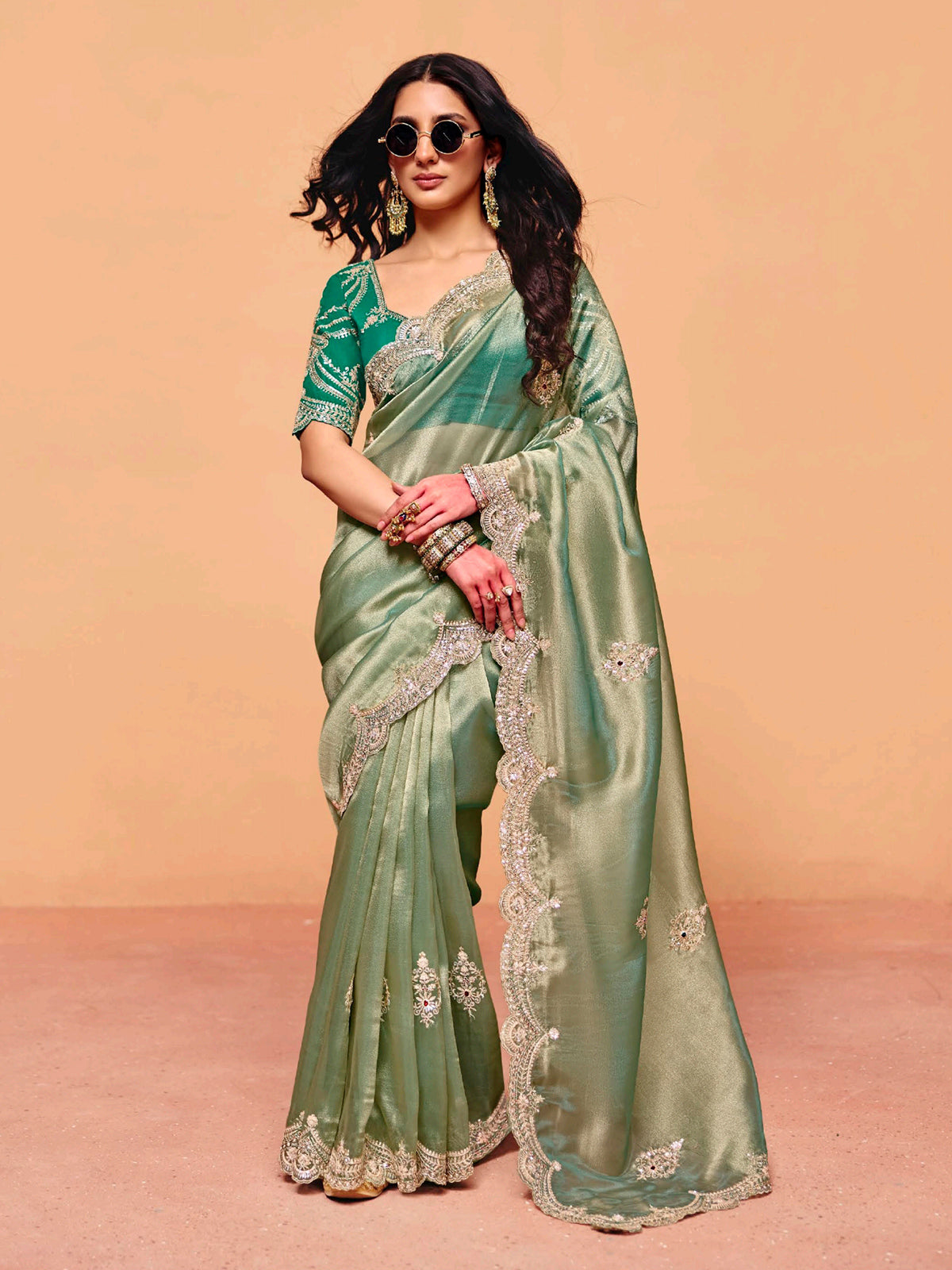 Pastel pista green tissue silk festive wear saree