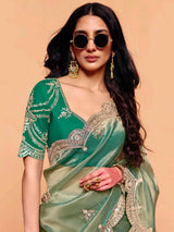 Pastel pista green tissue silk festive wear saree