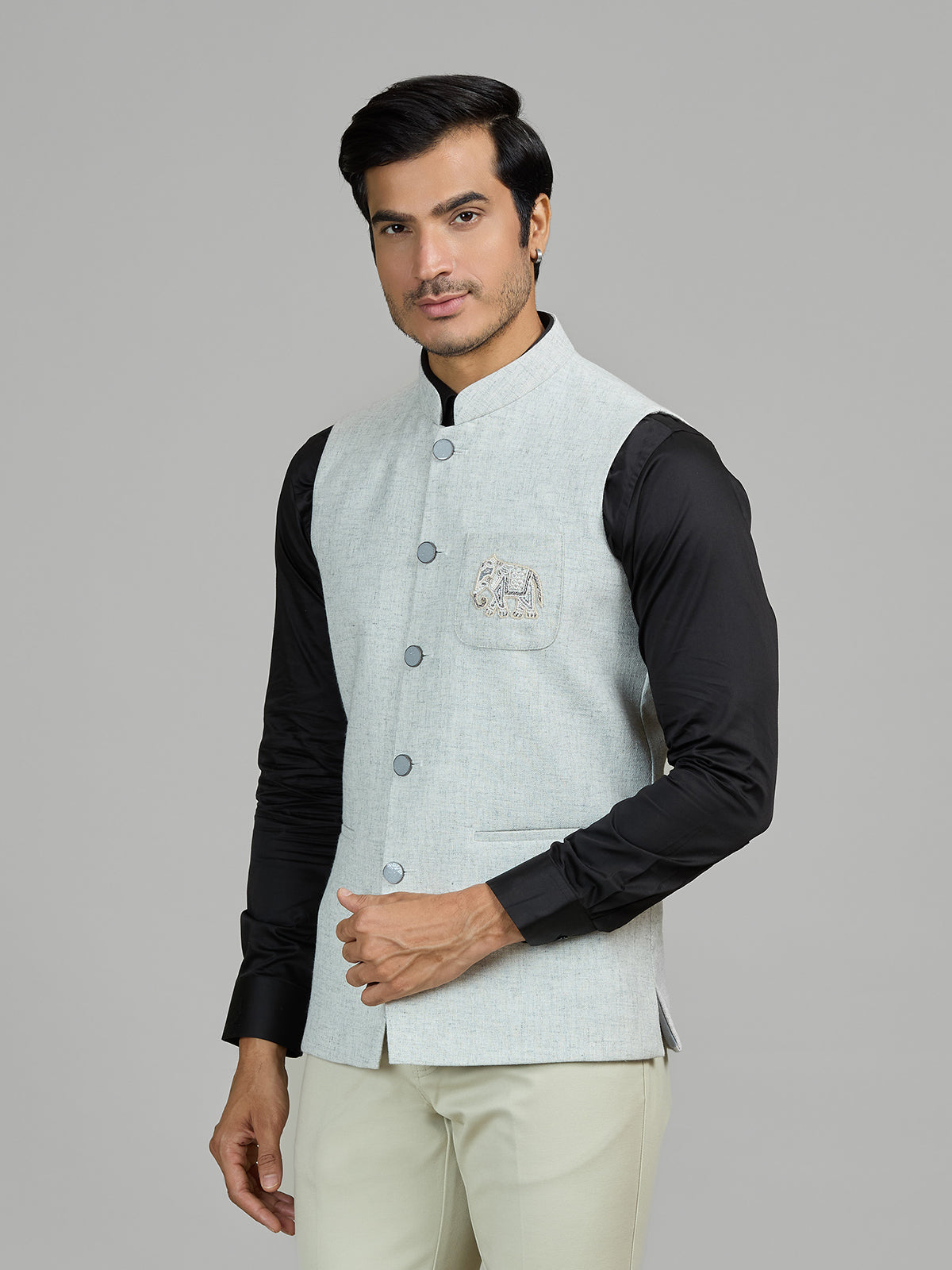 Mint blue linen wedding waistcoat with embellished pocket
