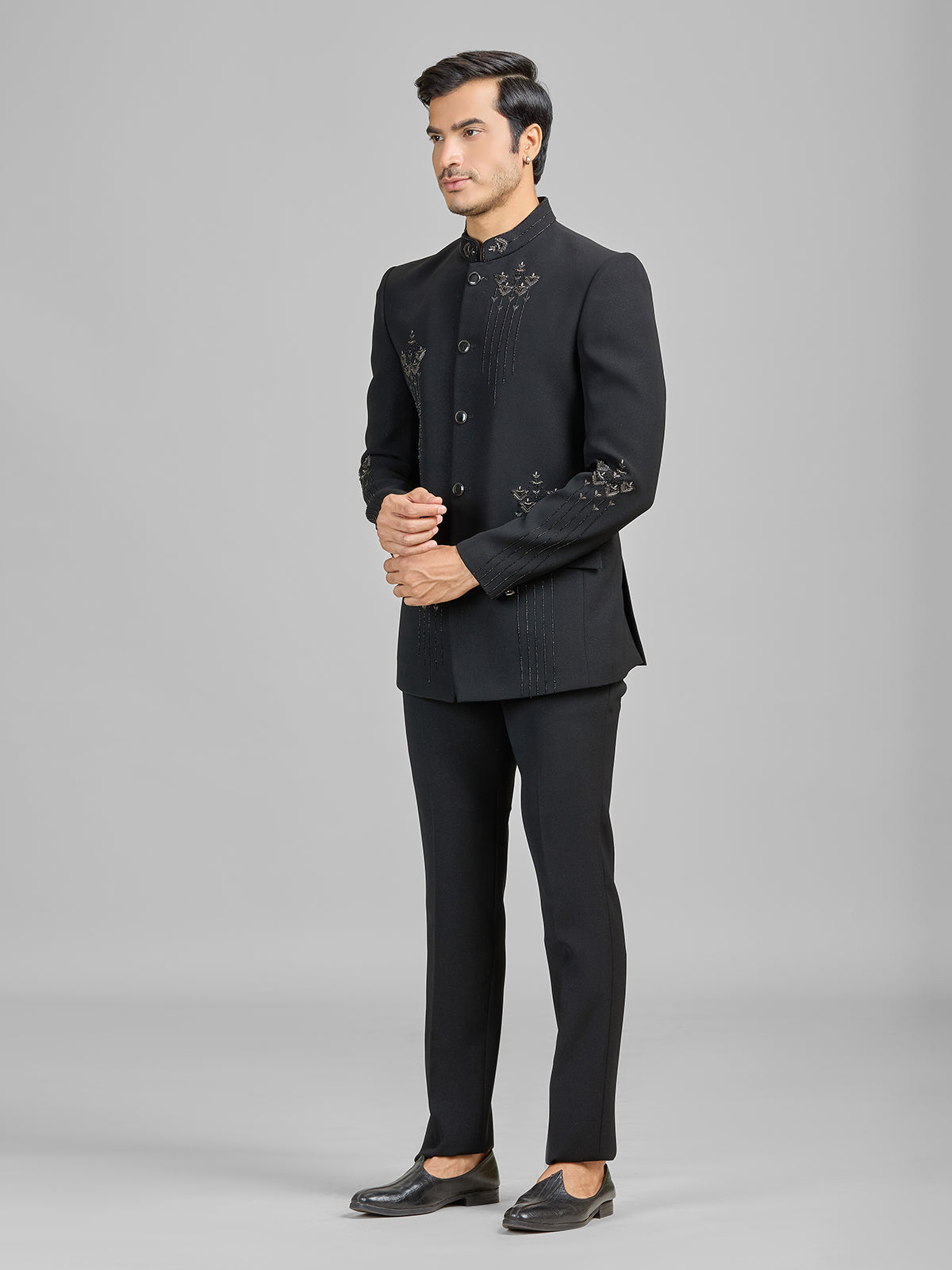Black terry rayon jodhpuri suit embellished with cutdana