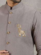 Grey linen waistcoat with shirt and zardosi embellished crest