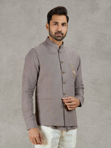 Grey linen waistcoat with shirt and zardosi embellished crest