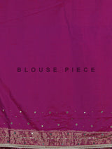 Regal purple art patola silk saree with ornate embellishments