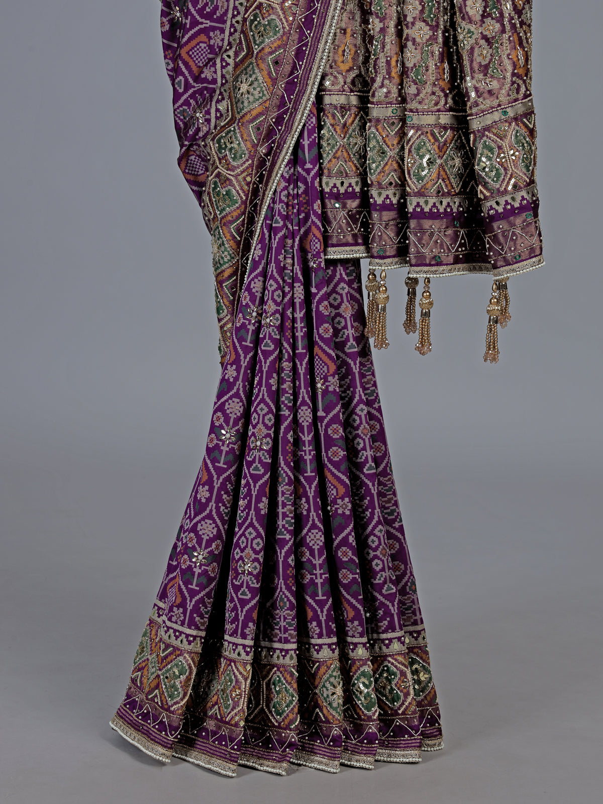 Regal purple art patola silk saree with embellished geometric weave