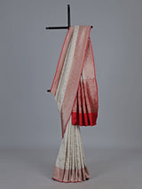 Off white banarasi silk saree with delicate zari detailing