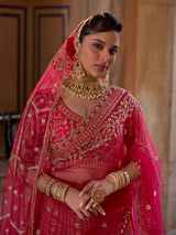 Pink silk net bridal lehenga choli with resham, cutdana and sequin work