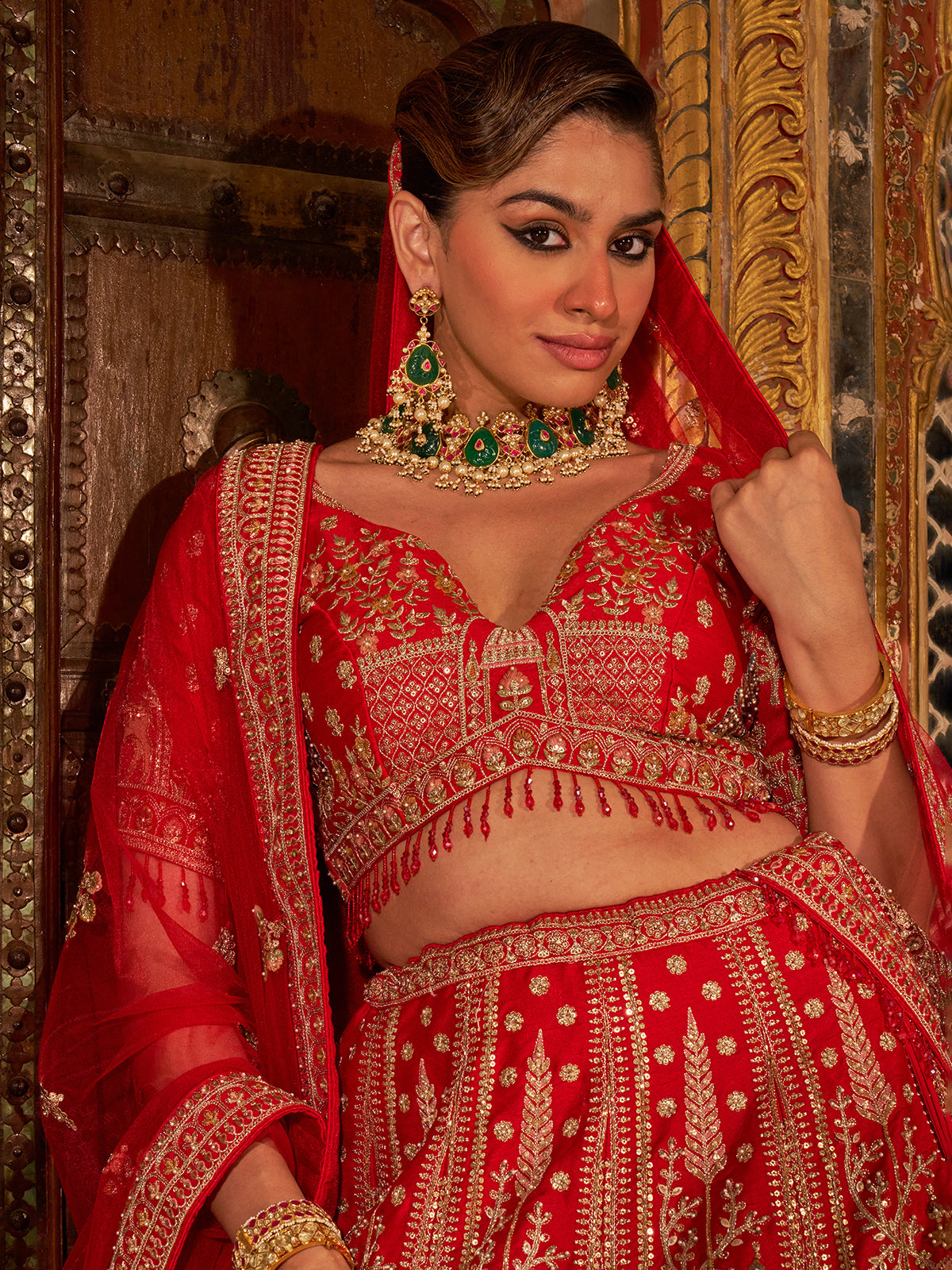 Classic red silk heavy bridal lehenga choli with net dupatta