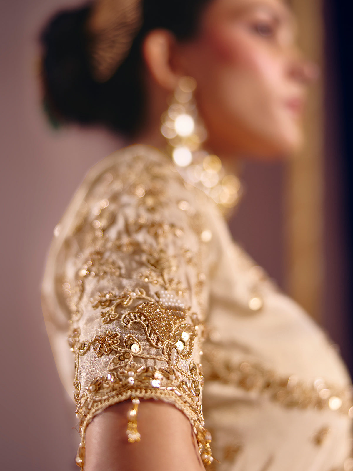 Cream viscose zari tissue saree with embellished border