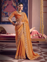 Pastel orange viscose zari tissue saree with embellished border