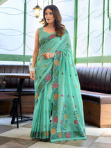Sophisticated seafoam green cotton linen saree with floral design