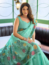 Sophisticated seafoam green cotton linen saree with floral design