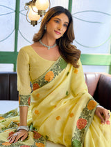 Radiant lemon yellow cotton linen saree with floral border