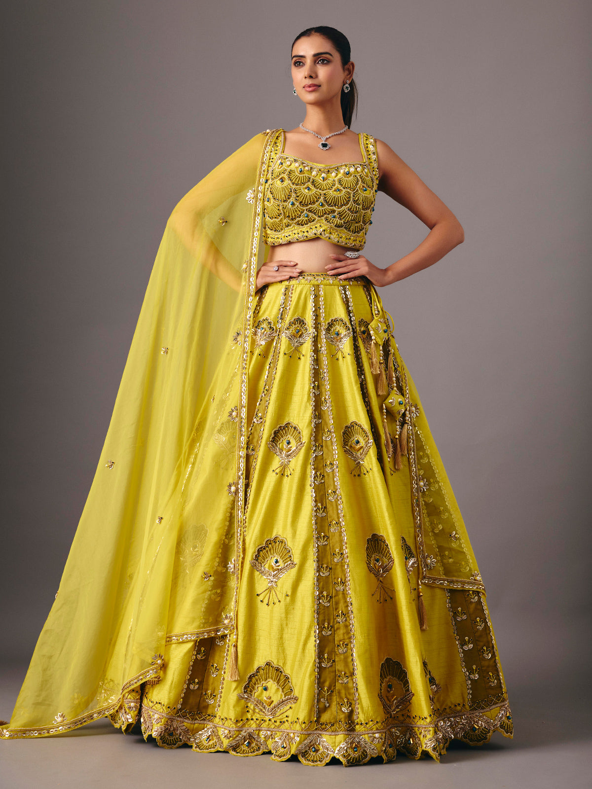 Lemon yellow raw silk lehenga choli with pearl embellishments