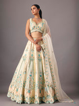 Cream silk lehenga choli with pearl and thread detailing
