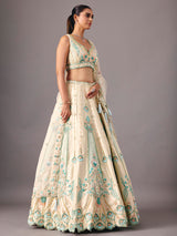 Cream silk lehenga choli with pearl and thread detailing