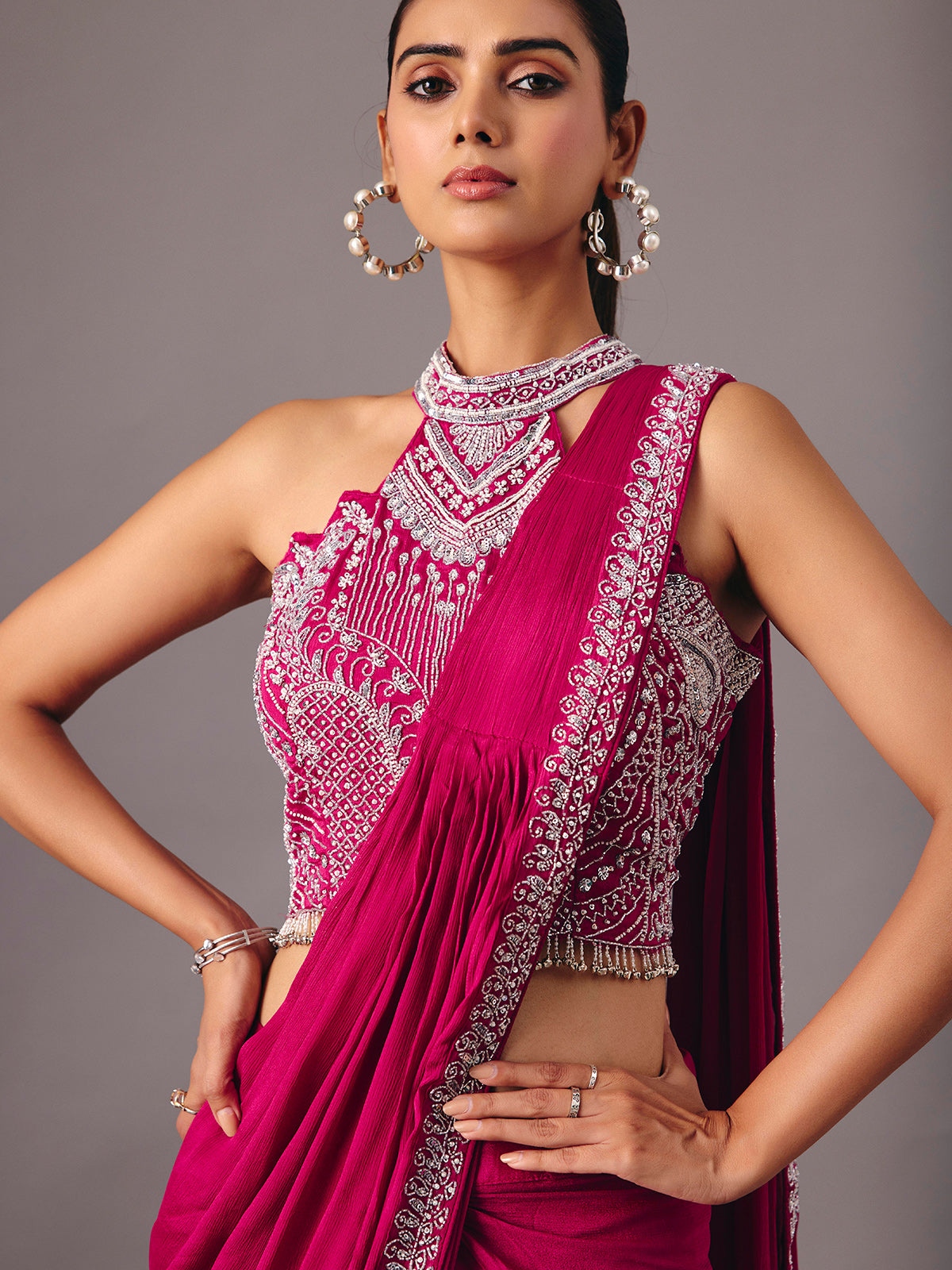 Magenta ready to wear saree with embellished halter blouse