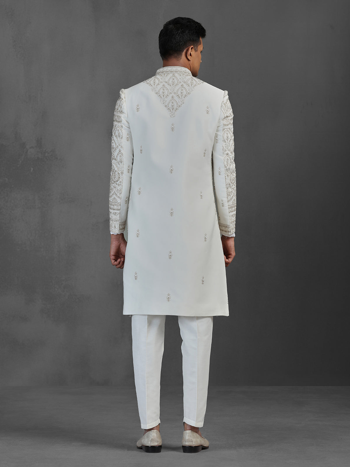 Cream silk embroidered sherwani for groom