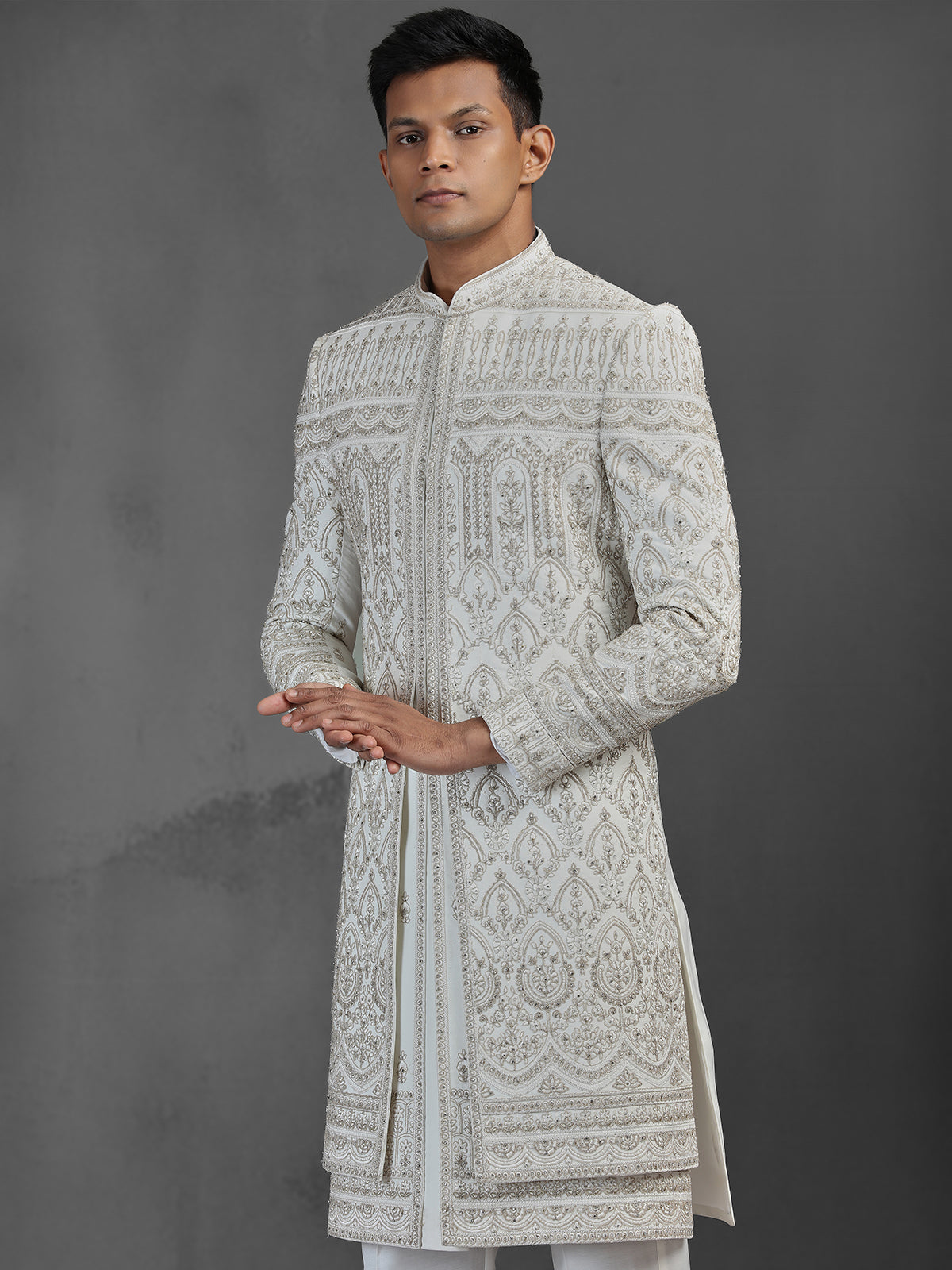 Cream silk embroidered sherwani for groom