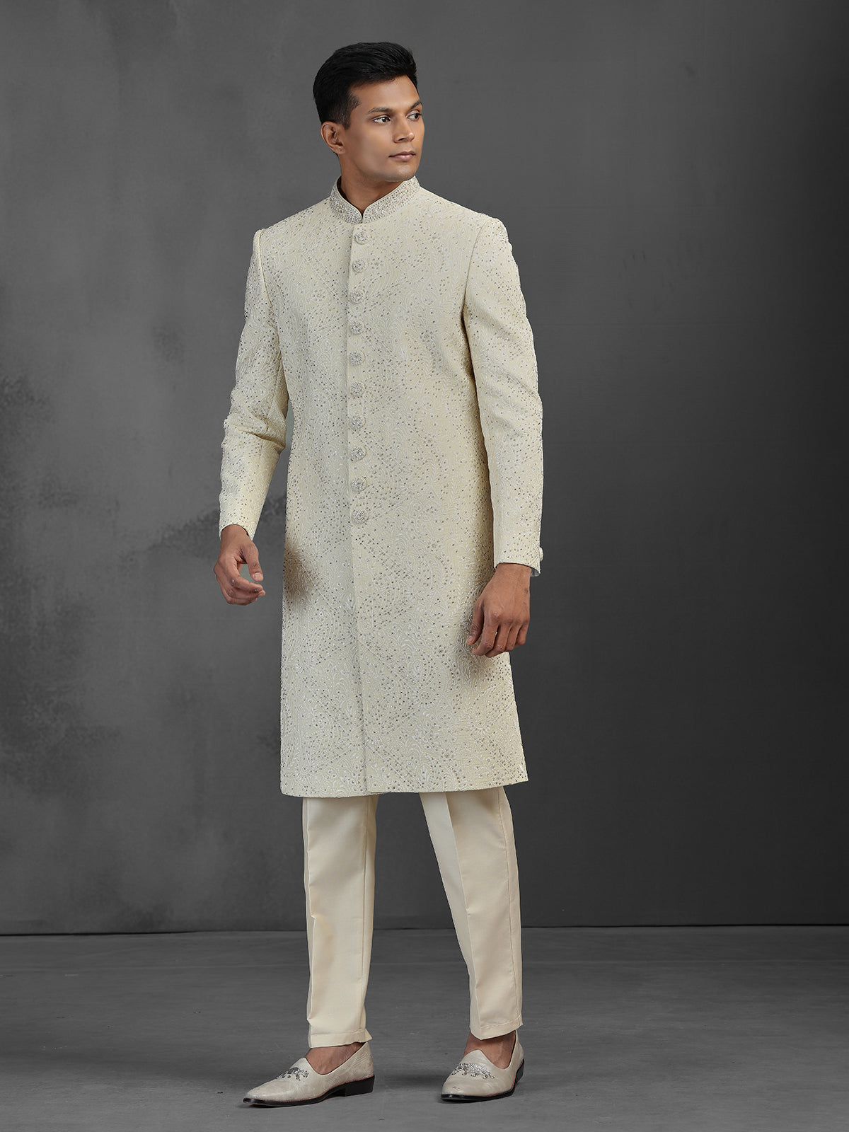 Cream silk wedding sherwani with embroidery