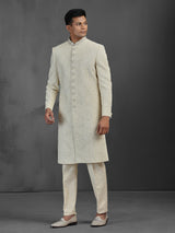 Cream silk wedding sherwani with embroidery