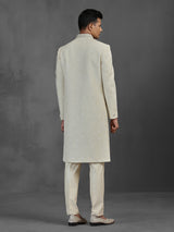 Cream silk wedding sherwani with embroidery