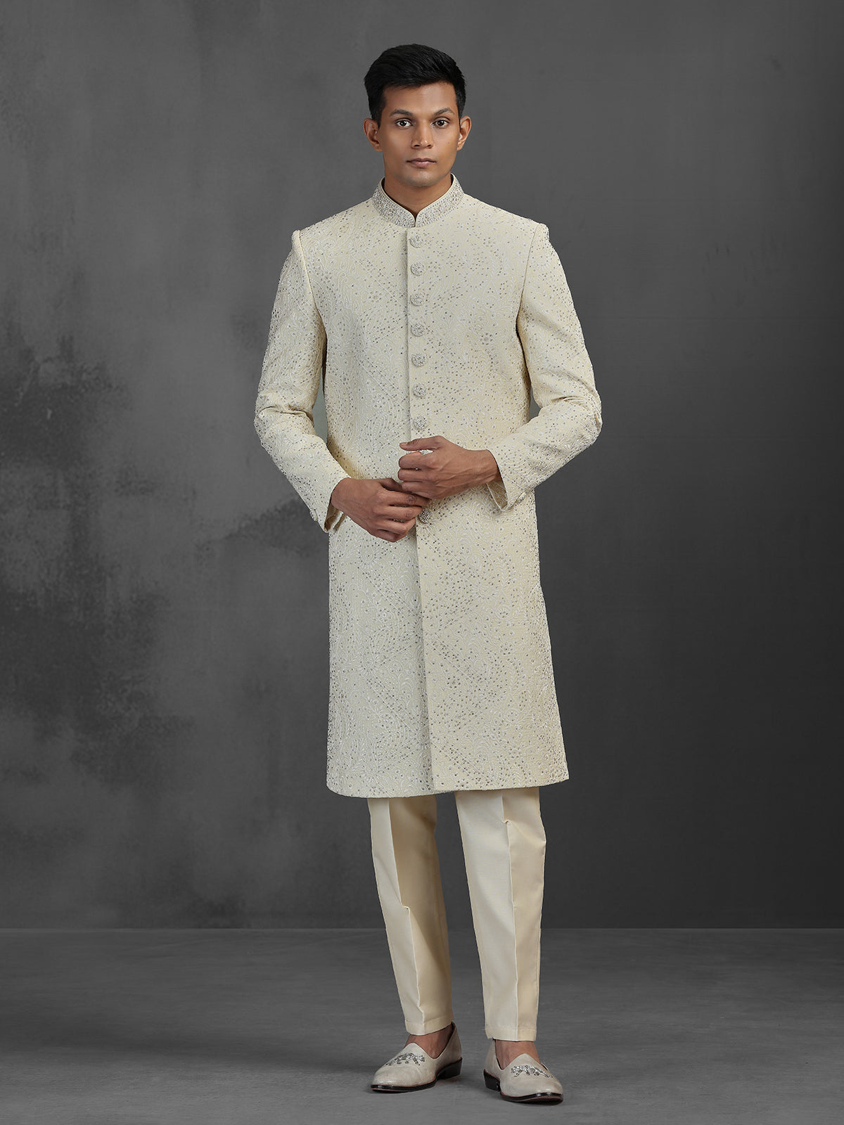 Cream silk wedding sherwani with embroidery