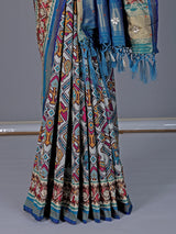 Blue semi patola silk saree with rich embellishments