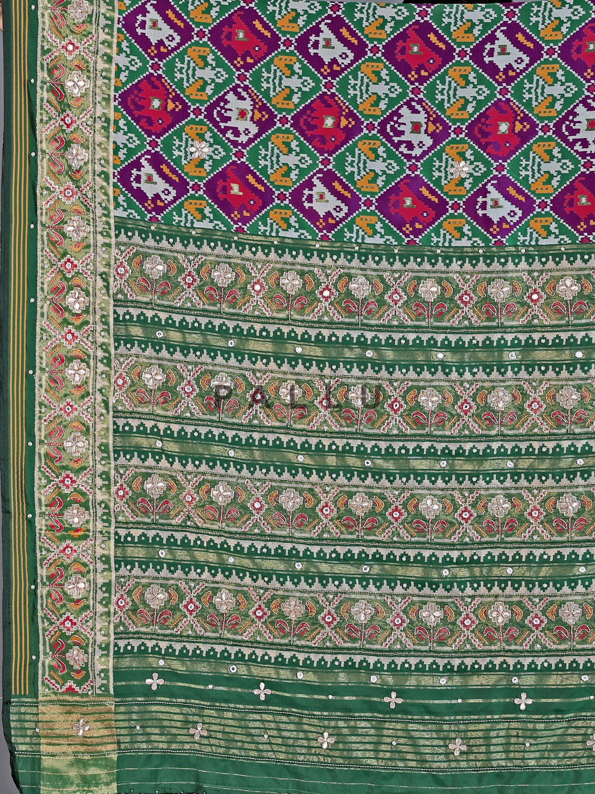 Purple and green art patola silk saree with motif design