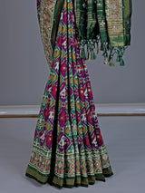 Purple and green art patola silk saree with motif design