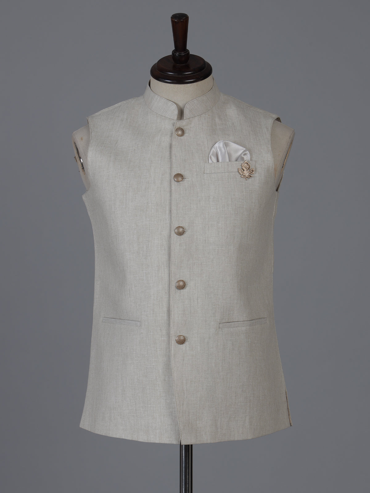 Beige linen waistcoat with brooch detailing
