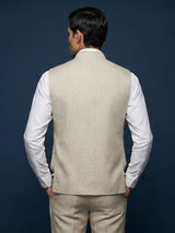 Beige linen waistcoat with brooch detailing