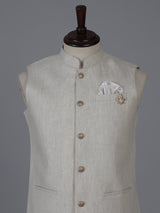 Beige linen waistcoat with brooch detailing