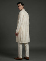 Cream silk kurta suiit with aabla and embroidery work