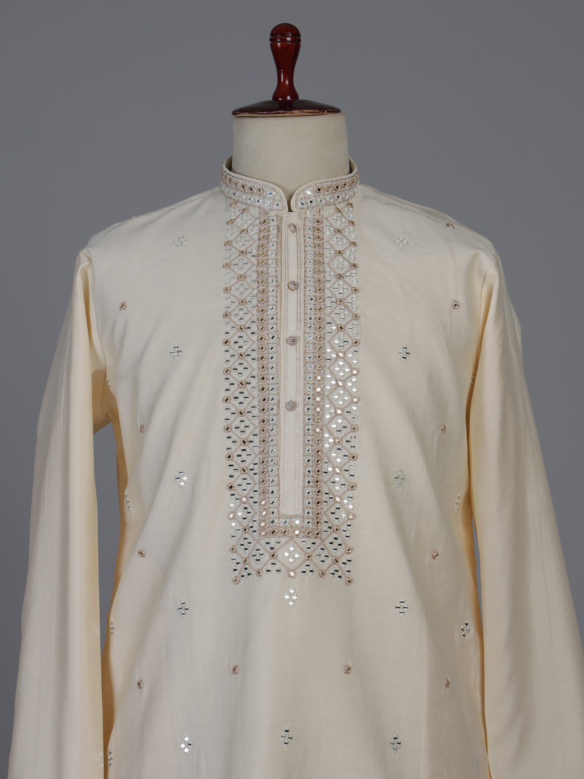 Cream silk kurta suiit with aabla and embroidery work