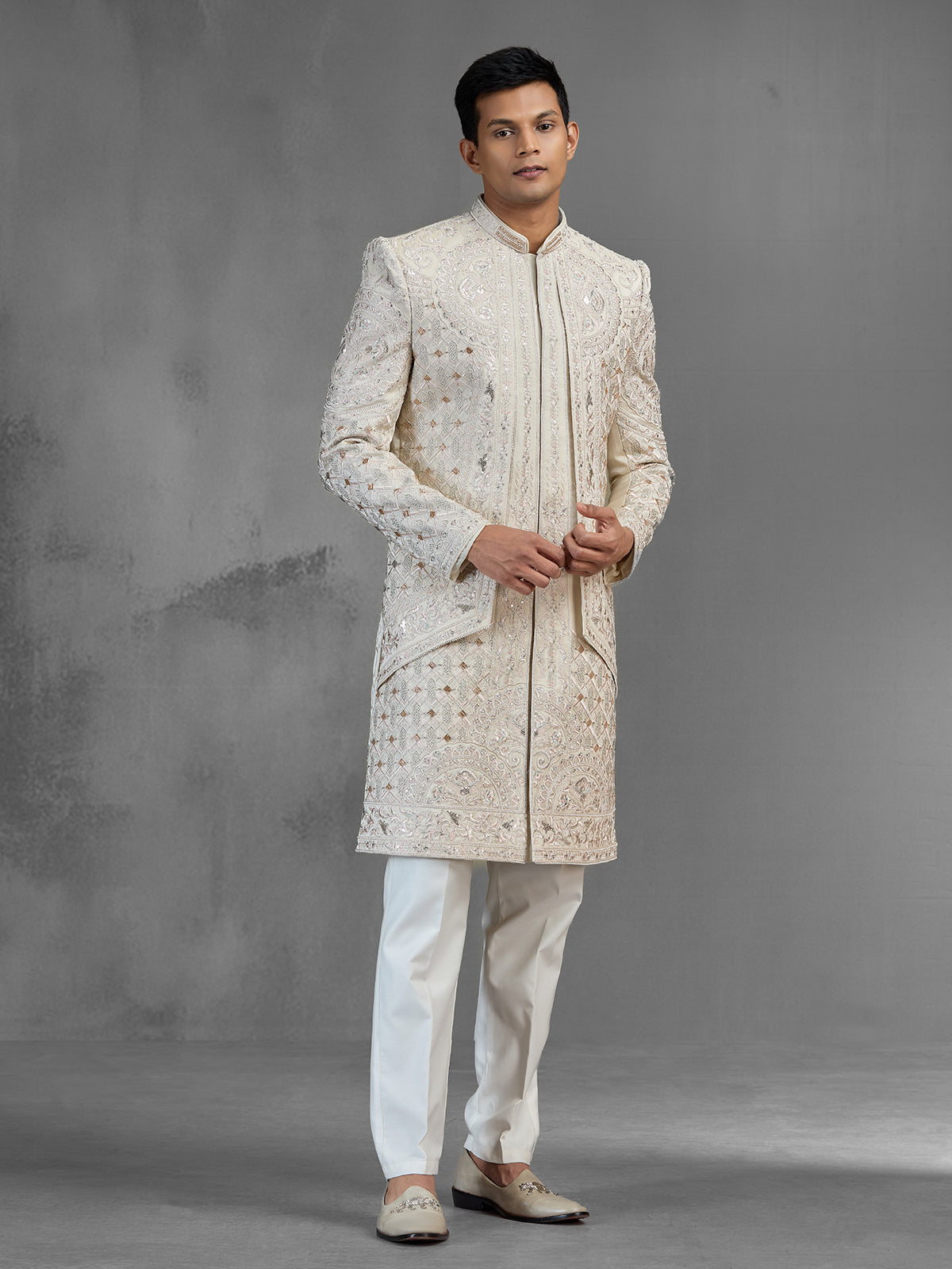 Beige silk open front sherwani with rich embroidery