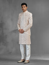 Cream silk open front sherwani with elegant detailing