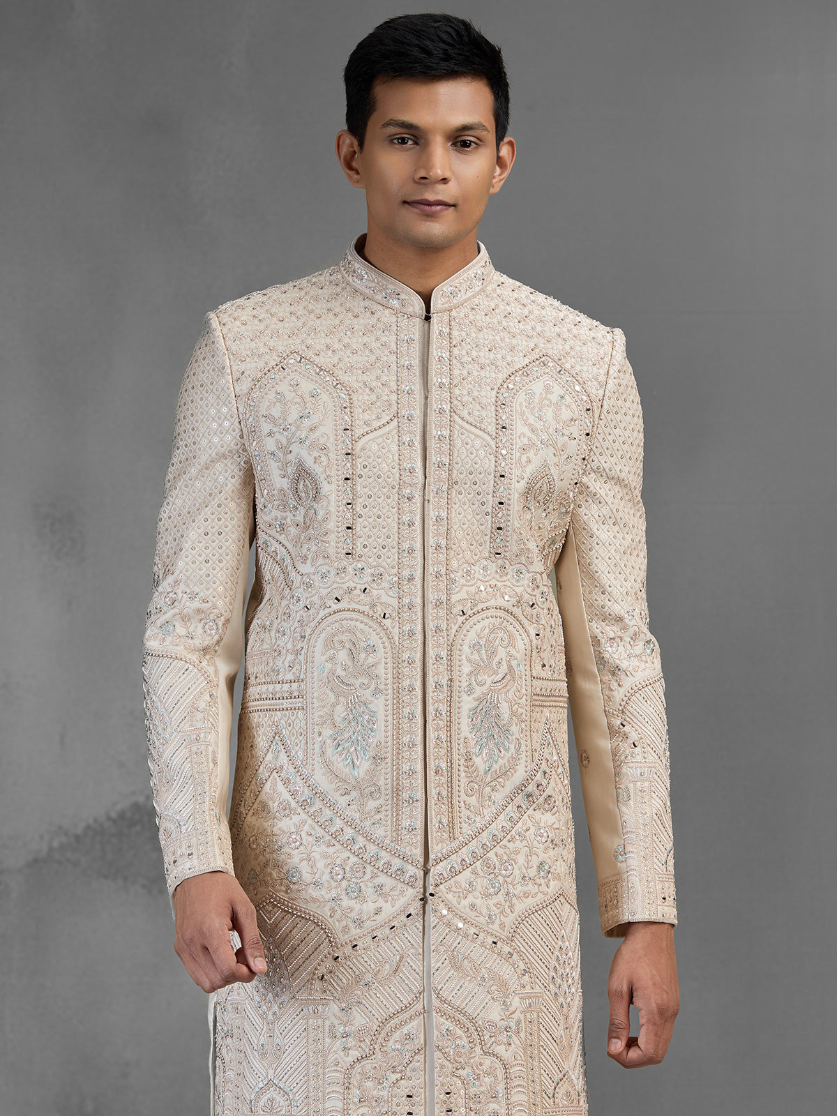 Rose gold raw silk sherwani with dense embroidery
