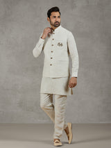 Beige linen waistcoat set with zari elephant embroidery