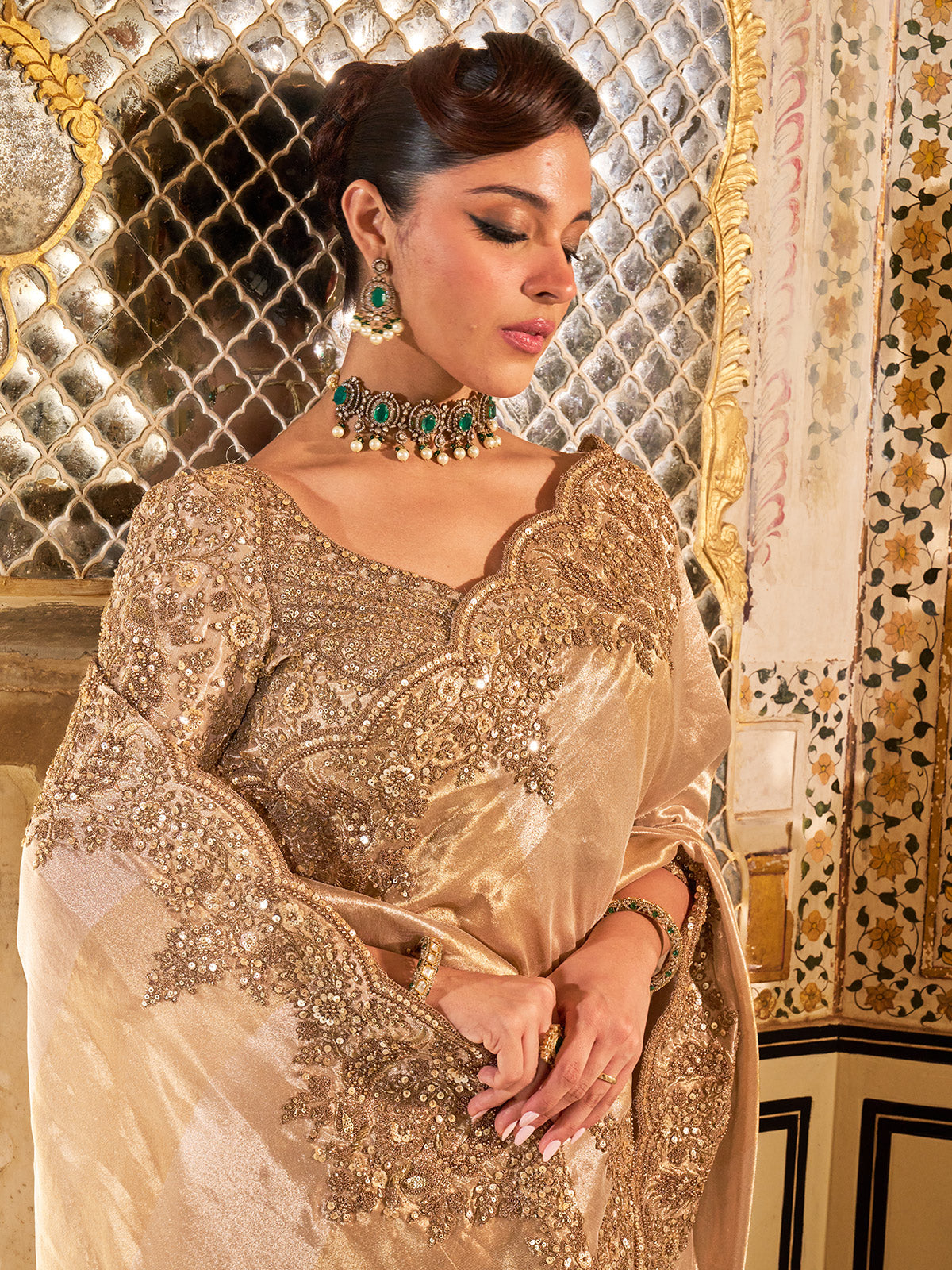 Gold shimmer tissue silk saree with subtle textured drape