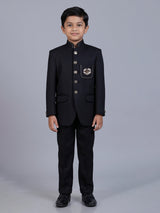 Black polyester viscose jodhpuri suit with brooch