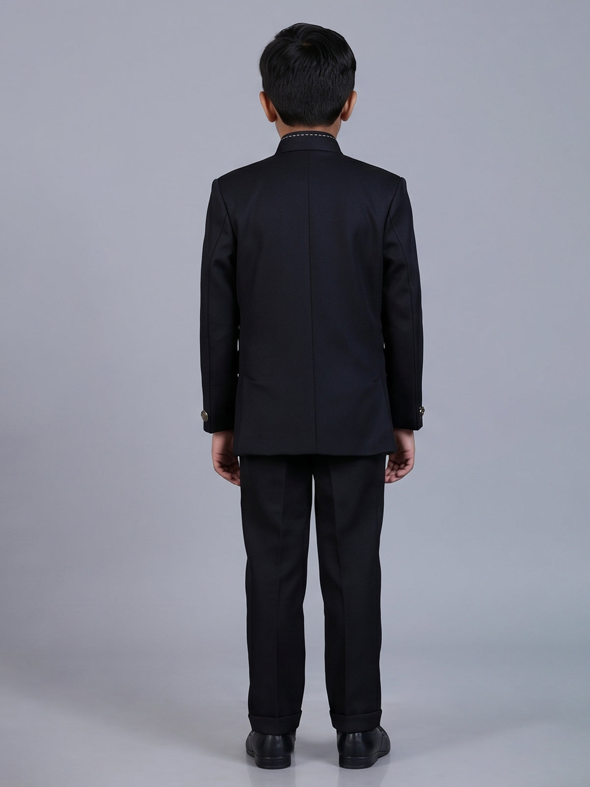 Black polyester viscose jodhpuri suit with brooch