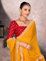 Mustard yellow georgette bandhej saree with sequins