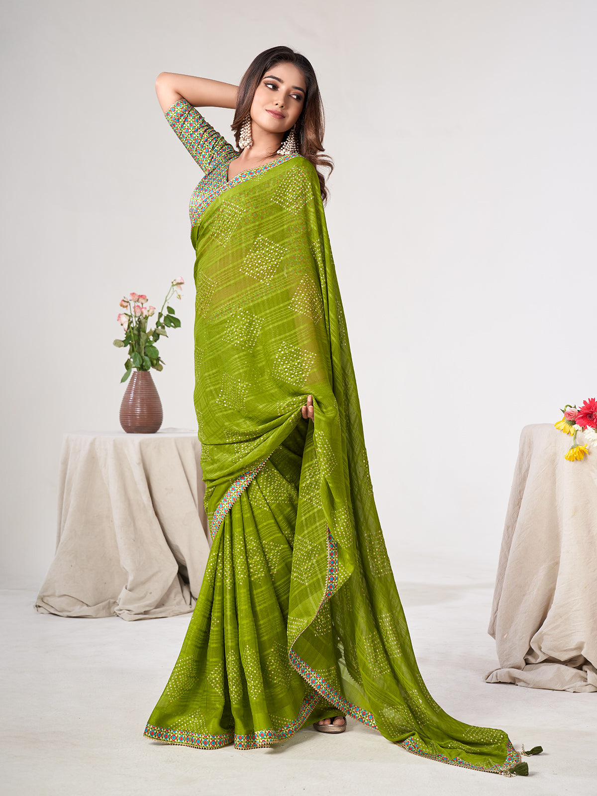 Parrot green georgette saree with gota detailing