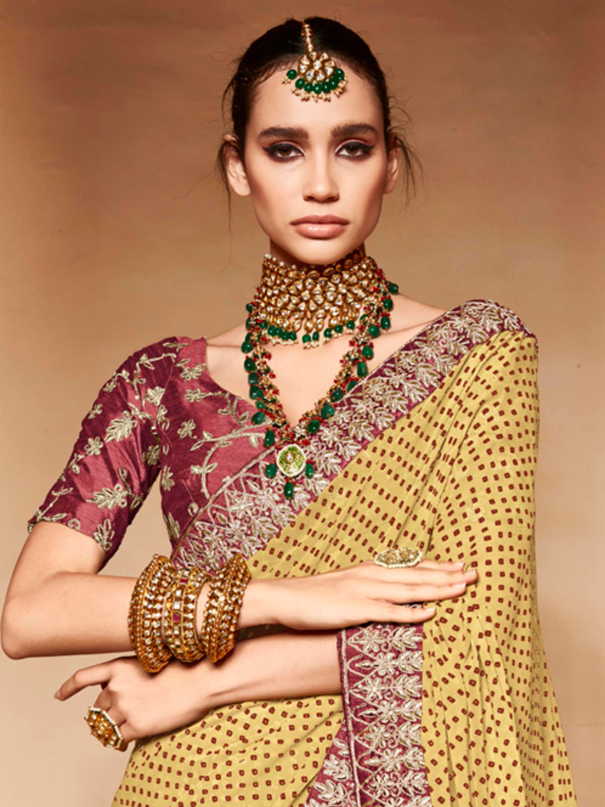 Yellow georgette bandhej saree with sequin detailing