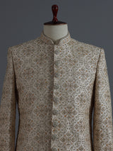 Beige silk sherwani with rich resham and zardosi accents